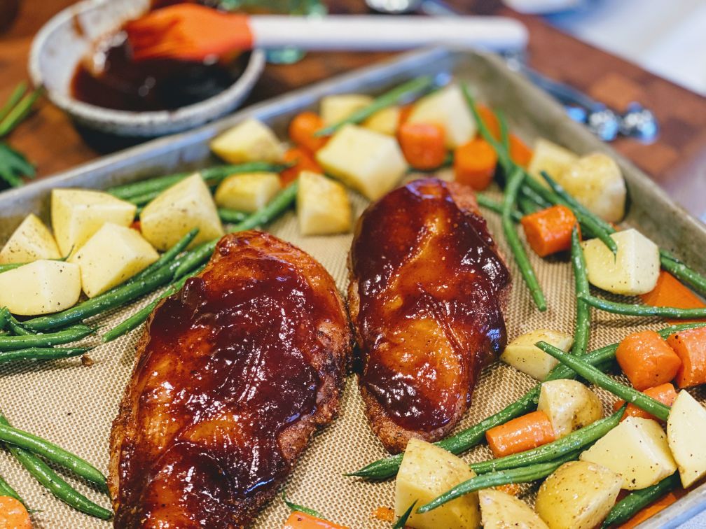 Wok of chicken, noodles and vegetables on the BBQ – Barbecook