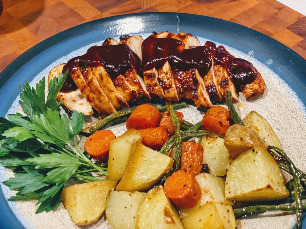 Wok of chicken, noodles and vegetables on the BBQ – Barbecook