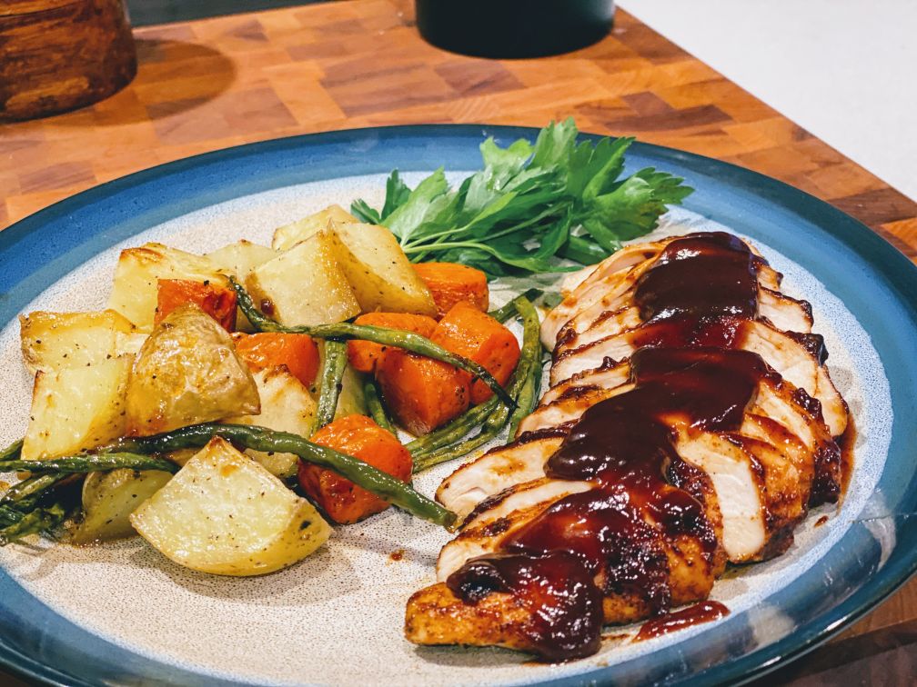 Wok of chicken, noodles and vegetables on the BBQ – Barbecook